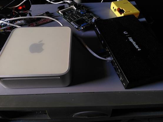 some smaller computers that run netbsd piled on top of a larger one that runs netbsd. see post body for descriptions of computers in this image.