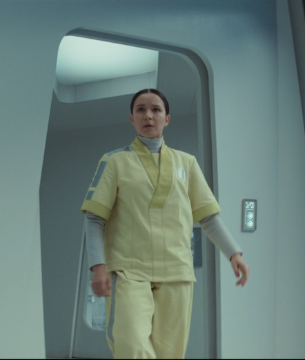 A still from Andor S2 E10 where Kleya enters a hospital to disconnect Luthen Rael's life support.