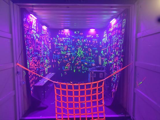 the video link to bornhack; lots of crowd-sourced art made with fluorescent tape