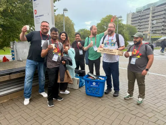 Same team, this time outside enjoying the two bottles of "very special and unique" beer that bofh@ got for speaking and another colleague and I got for paying an obscene amount of money at the auction. Drunking from paper cups, obviously.