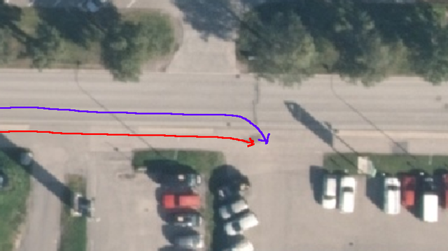 Map overview of the situation, two parallel lines suddenly intersecting at the entrance to a parking lot.