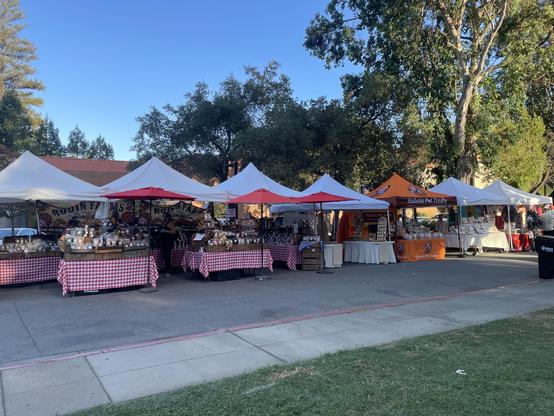 Vendors selling gourmet food and pet treats. Near closing and most people were over at the band.