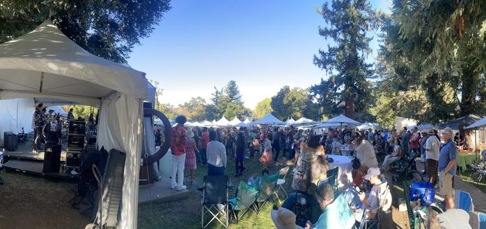 Lots of people listening and dancing to the Houserockers band.