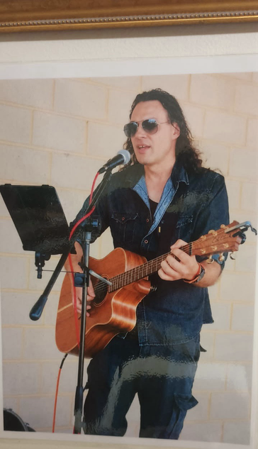 Me singing and playing guitar.