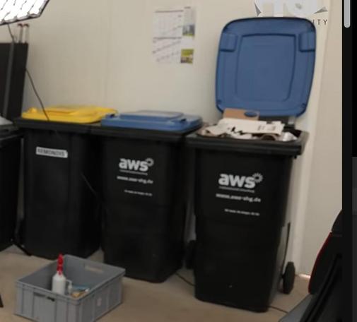 trash bins with "AWS" wording
