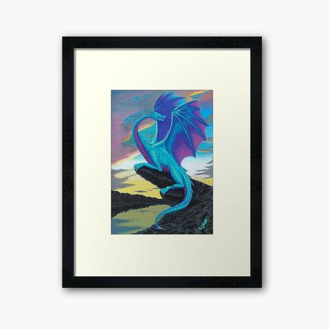 A framed print of an acrylic marker drawing of a dragon sitting on a rocky outcrop in front of a sunset and over a mountain lake. The dragon is brightly coloured in teal, purple, pink, and blue.