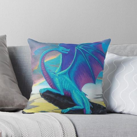 My brightly coloured drawing of a dragon on a throw cushion.