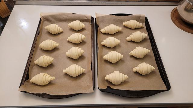 The first few are always weird "not in the groove yet" rolls. Should still taste fine once they've been baked, they just won't be as pretty.