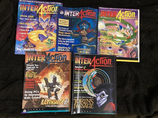 Five issues of Sierra InterAction magazine from the mid 90s:
Covers - left to right, top to bottom:

Holiday 1994: King's Quest VII
Summer 1993: Betrayal at Krondor
Spring 1995: The Lost Mind of Dr. Brain
Spring 1996: MetalTech EarthSiege 2
Holiday 1995: Torin's Passage