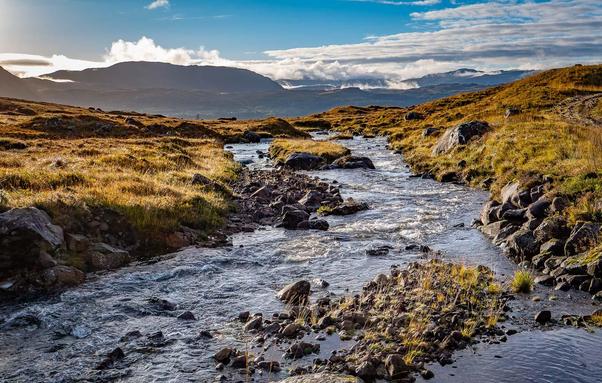 A river in a high highland landscape.