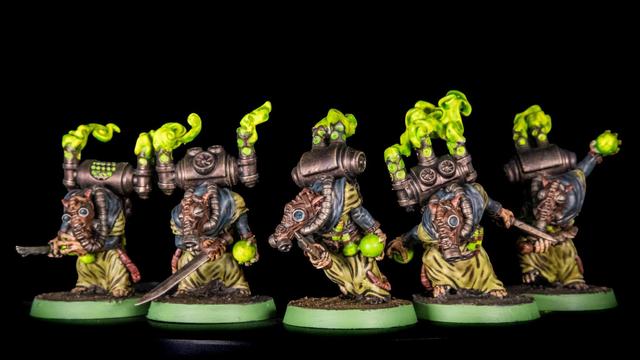 Five rats in gas masks