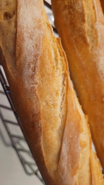 A close up of one of the "ears", but really "not ear enough", of the baguettes.