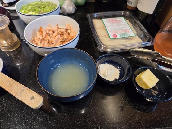 little bowls of ingredients ready to add to a dinner dish.