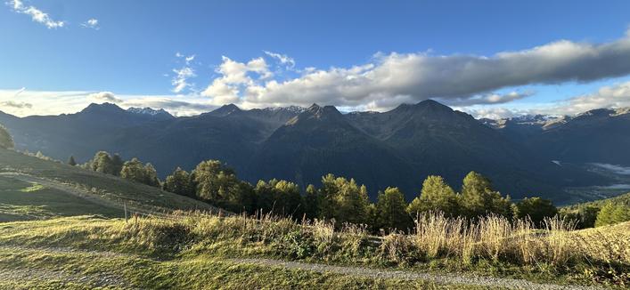 View of the mountains on the south side of the lower Engadine valley taken from Alp Sura (2,118 m). The center three mountains from left to right are Piz Sursass, Piz Giarsinom, and Piz Mezdi.
