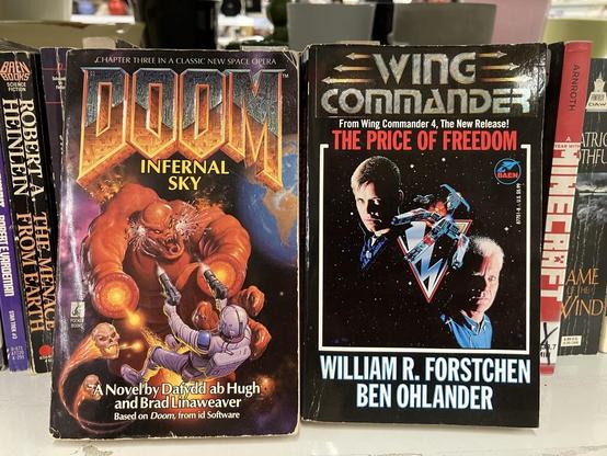 Two paperbacks based on computer games:

Doom Infernal Sky 
and
Wing Commander: The Price of freedom.