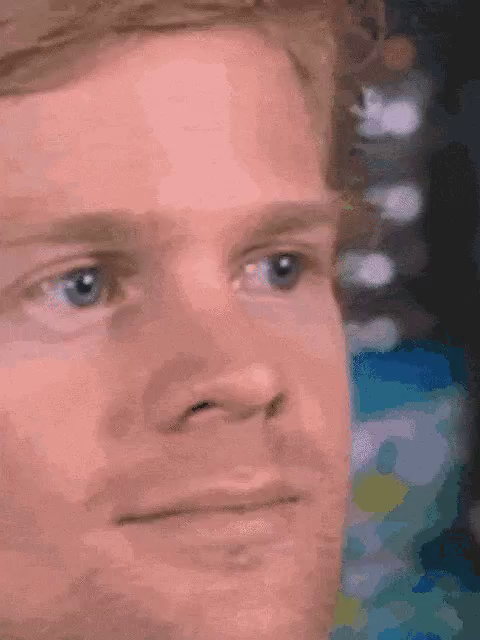 confused and surprised blinking guy gif