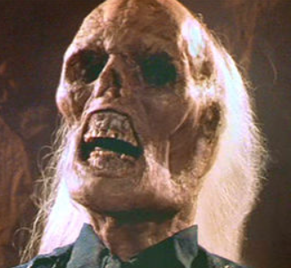 a skeletal face as a man is abruptly aged by many hundreds of years until dust
(from Indiana Jones and the Last Crusade where Donovan drinks from the wrong Grail)
(spoilers)