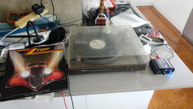 On the kitchen breakfast bar (stone benchtop, nice and rigid):

- recently repaired Rotel RP1001 turntable
- ARTcessories DJPre II turntable preamp
- Behringer UCA-202 USB audio interface
- the cover to ZZ Top "Eliminator"

The record is of course playing on the turntable.