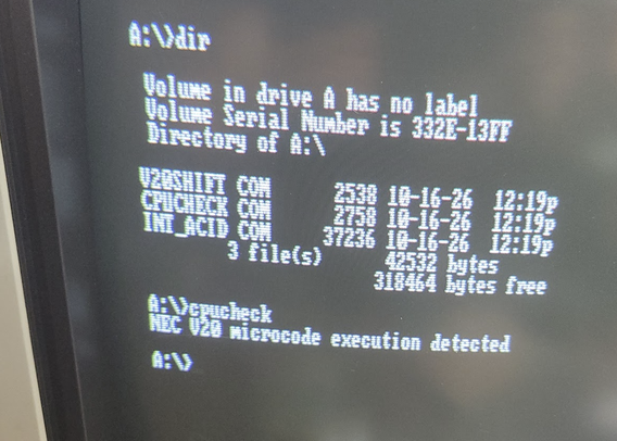 a screenshot of GloriousCow's 'cpucheck.com' running on an IBM 5150 with a V20, showing successful detection of microcode temporary register leaks.  "NEC V20 microcode execution detected" has been printed, and then returned to the A:\> prompt.