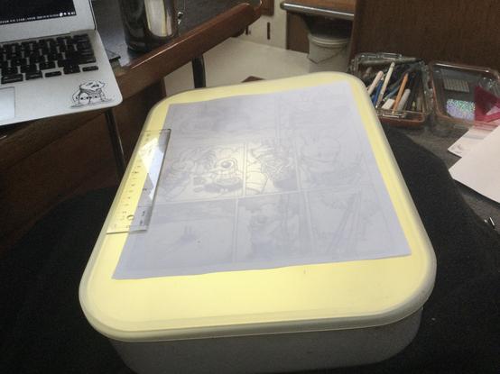 A diy light table consisting of a rechargeable led light in a storage bin with a semi transparent lid.