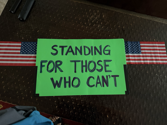 The reverse side saying standing for those who can't.