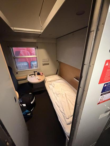 Sleeper compartment with bed made
