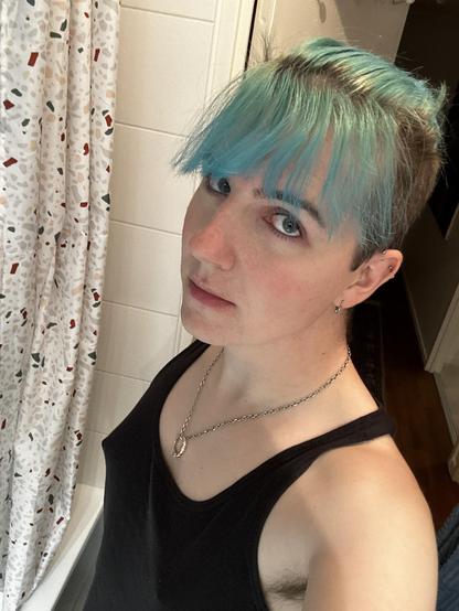 selfie in a black tank top, i've got some makeup on