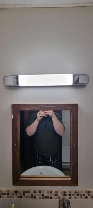 Mirror is too low, unable to see my face at eye level.