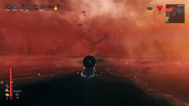 Player charcter standing in front of a stretch of land, with red sea all around it, and red skies above. Far in teh distance large rock spikes rise out of the sea. At the end of the stretch of land stands a bare tree, eagles circling above it.